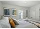 Bright bedroom featuring a bed with decorative pillows and artwork on the walls at 5312 Norwaldo Ave, Indianapolis, IN 46220