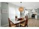 Dining room featuring a large table and view of the kitchen, perfect for Gathering meals at 5312 Norwaldo Ave, Indianapolis, IN 46220