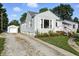 Charming home featuring a long driveway and a one-car detached garage at 5312 Norwaldo Ave, Indianapolis, IN 46220
