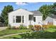 Charming home with landscaped yard and inviting front porch, perfect curb appeal at 5312 Norwaldo Ave, Indianapolis, IN 46220