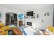 Bright and modern living room featuring a fireplace and open concept design at 5312 Norwaldo Ave, Indianapolis, IN 46220