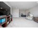 Spacious basement featuring a television entertainment area and a cozy seating arrangement at 5351 Rose Dr, Zionsville, IN 46077