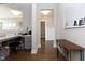 Hallway with a view of an office and whiteboard with space for organization at 5351 Rose Dr, Zionsville, IN 46077