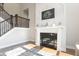 Living room with a fireplace and decorative mantle at 5351 Rose Dr, Zionsville, IN 46077