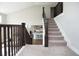 View of a staircase that overlooks the kitchen area at 5351 Rose Dr, Zionsville, IN 46077