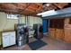 Laundry room showcasing modern washer and dryer units, ample counter space, and natural light at 5803 Schoolwood Dr, Speedway, IN 46224