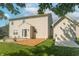 Backyard with a small building and patio area, perfect for outdoor entertaining at 6045 Copeland Mills Ct, Indianapolis, IN 46221