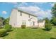 A spacious backyard with a swing set and view of the rear of the house at 6045 Copeland Mills Ct, Indianapolis, IN 46221