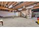 Large unfinished basement with exposed beams and open layout, perfect for customization at 6045 Copeland Mills Ct, Indianapolis, IN 46221