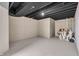 Bright basement space with clean walls and open ceiling, ideal for a variety of uses at 6045 Copeland Mills Ct, Indianapolis, IN 46221