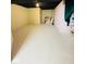 Unfinished basement with painted concrete floor at 6045 Copeland Mills Ct, Indianapolis, IN 46221