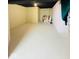 Unfinished basement with painted concrete floor at 6045 Copeland Mills Ct, Indianapolis, IN 46221