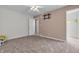 This bedroom features neutral walls, a ceiling fan, carpet, and is ready for a TV at 6045 Copeland Mills Ct, Indianapolis, IN 46221