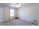 Bright bedroom with a ceiling fan and neutral carpet at 6045 Copeland Mills Ct, Indianapolis, IN 46221