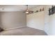 Bedroom features neutral carpet, ceiling fan, and ample closet space at 6045 Copeland Mills Ct, Indianapolis, IN 46221