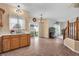 Kitchen and dining area with sliding glass doors to outside, tile flooring, and natural light at 6045 Copeland Mills Ct, Indianapolis, IN 46221
