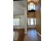 Spacious foyer with high ceilings, and a view of the formal living room at 6045 Copeland Mills Ct, Indianapolis, IN 46221