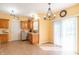 Bright kitchen with eat-in area, featuring lots of cabinet space and a sliding glass door at 6045 Copeland Mills Ct, Indianapolis, IN 46221