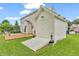 Outdoor storage shed offers easy access with its ramp entrance and convenient lantern lighting at 6045 Copeland Mills Ct, Indianapolis, IN 46221