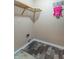 Walk-in closet with installed shelving and modern flooring at 6045 Copeland Mills Ct, Indianapolis, IN 46221