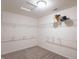 Spacious walk-in closet with ample shelving at 6045 Copeland Mills Ct, Indianapolis, IN 46221