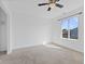 Bright bedroom with carpet and large window with outdoor view at 618 Stobus Dr, Greenwood, IN 46143