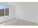 Bright bedroom with carpet and large window with outdoor view at 618 Stobus Dr, Greenwood, IN 46143
