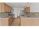 Kitchen boasts modern appliances, generous counter space, and bright lighting at 618 Stobus Dr, Greenwood, IN 46143