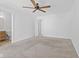Primary bedroom features carpet, a ceiling fan and an attached bathroom at 618 Stobus Dr, Greenwood, IN 46143