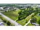 Aerial view of a property with a large green lot near road access at 6637 E County Road 600 S, Plainfield, IN 46168