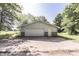 Exterior shot of a detached two car garage in a country setting at 6637 E County Road 600 S, Plainfield, IN 46168