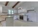 This kitchen features white cabinetry, stainless steel appliances, and ample counter space at 6637 E County Road 600 S, Plainfield, IN 46168