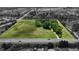 Areal shot of a large parcel of land ready for development with nearby subdivisions and pond in a desirable location at 6637 E County Road 600 S, Plainfield, IN 46168