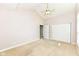 Bright bedroom featuring a ceiling fan and closet at 6656 Easy St, Fishers, IN 46038