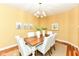 Elegant dining room with a wood table and sophisticated decor at 6656 Easy St, Fishers, IN 46038
