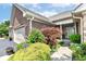 Inviting home exterior showcasing a brick facade and landscaped front entrance at 6656 Easy St, Fishers, IN 46038