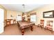 Recreation room featuring a billiard table, cozy seating, and a neutral color scheme at 6656 Easy St, Fishers, IN 46038
