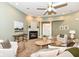 Well-lit living area with a fireplace and views of the front entrance at 6656 Easy St, Fishers, IN 46038