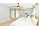 Well-lit main bedroom features vaulted ceiling, closets, and bathroom at 6656 Easy St, Fishers, IN 46038