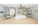 Main bedroom featuring a ceiling fan and accent chairs at 6656 Easy St, Fishers, IN 46038