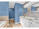 Bathroom with a double sink vanity and soaking tub at 6686 Woodcrest Dr, Avon, IN 46123