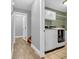 Efficient laundry room with modern appliances, white cabinetry, and convenient storage solutions at 6686 Woodcrest Dr, Avon, IN 46123