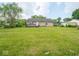 Spacious backyard with a deck, providing a perfect setting for relaxation and outdoor entertainment at 7645 Inverness Dr, Indianapolis, IN 46237