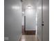 Bright hallway with tile and wood flooring leading into the house at 7645 Inverness Dr, Indianapolis, IN 46237