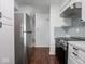 Kitchen featuring stainless steel refrigerator and oven, plus bright countertop at 7645 Inverness Dr, Indianapolis, IN 46237