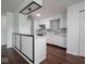 Modern kitchen featuring white cabinets, stainless steel appliances, and stylish backsplash at 7645 Inverness Dr, Indianapolis, IN 46237
