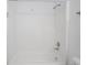 A clean, white shower with a tub and standard shower head in a well maintained bathroom at 7645 Inverness Dr, Indianapolis, IN 46237