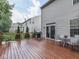 View of the wood deck with an outdoor grill, and table and chairs perfect for outdoor dining at 8415 Alcona Dr, Indianapolis, IN 46237