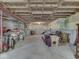 Unfinished basement with concrete floor and exposed ceiling at 8415 Alcona Dr, Indianapolis, IN 46237