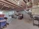 Unfinished basement with concrete floor and exposed ceiling at 8415 Alcona Dr, Indianapolis, IN 46237